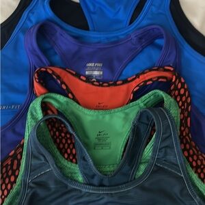 Nike Pro Dri-FIT Tank Tops in Blue, Purple, and Green 
The yellow is new